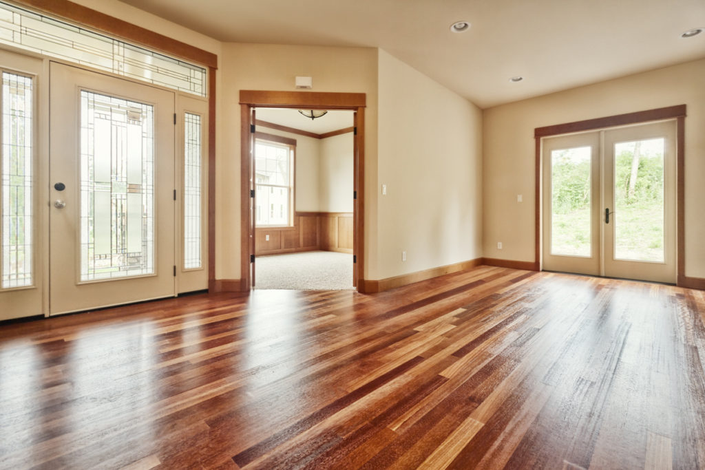 New house interior entrance hardwood floors natural light filled